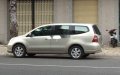 Nissan Livina 2010 - Cần bán lại xe Nissan Livina năm sản xuất 2010, màu bạc